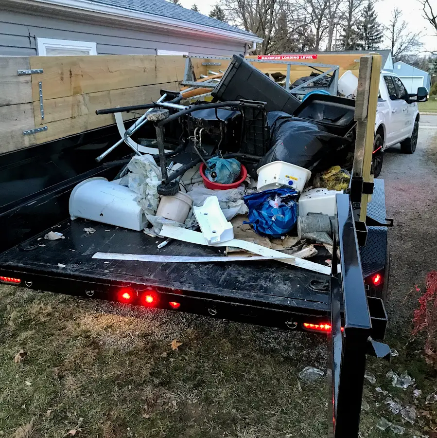 Roll-off dumpster delivered to a residential driveway in Cudahy